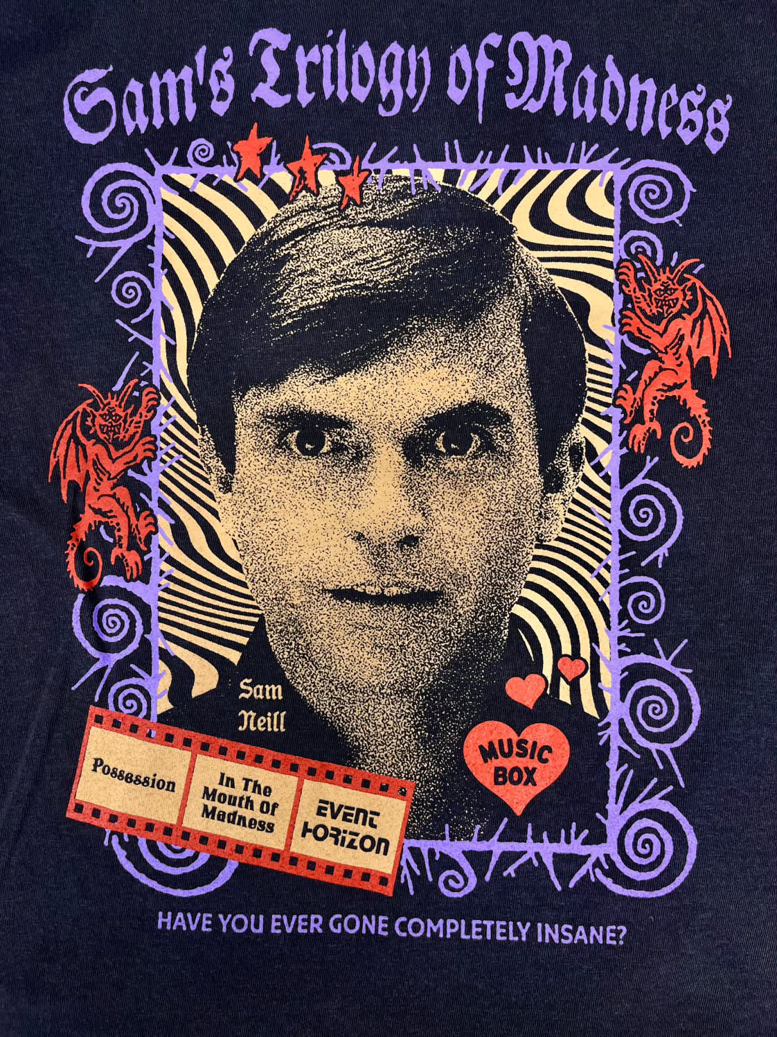 Sam Neill Trilogy of Madness Tee